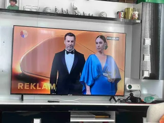 T** O.