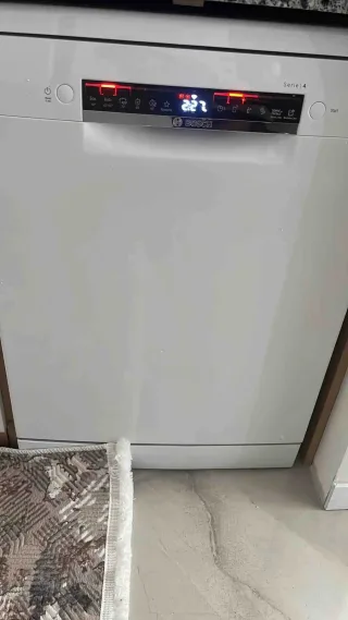 Ö** T.