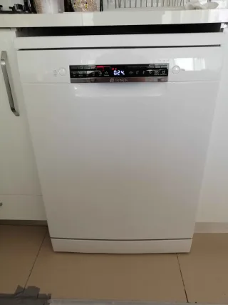 M** T.