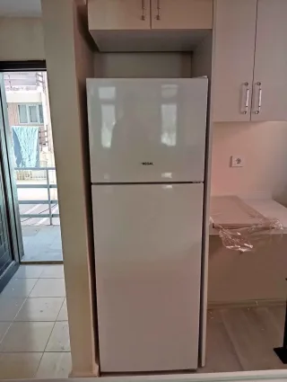 N** T.